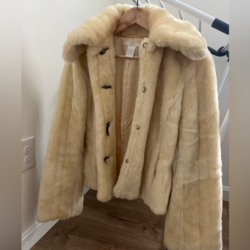 Realistic, faux fur jacket coat